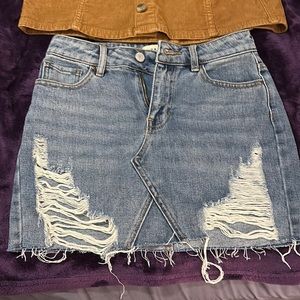 Two skirts one corduroy skirt size 0 and one denim skirt size 23